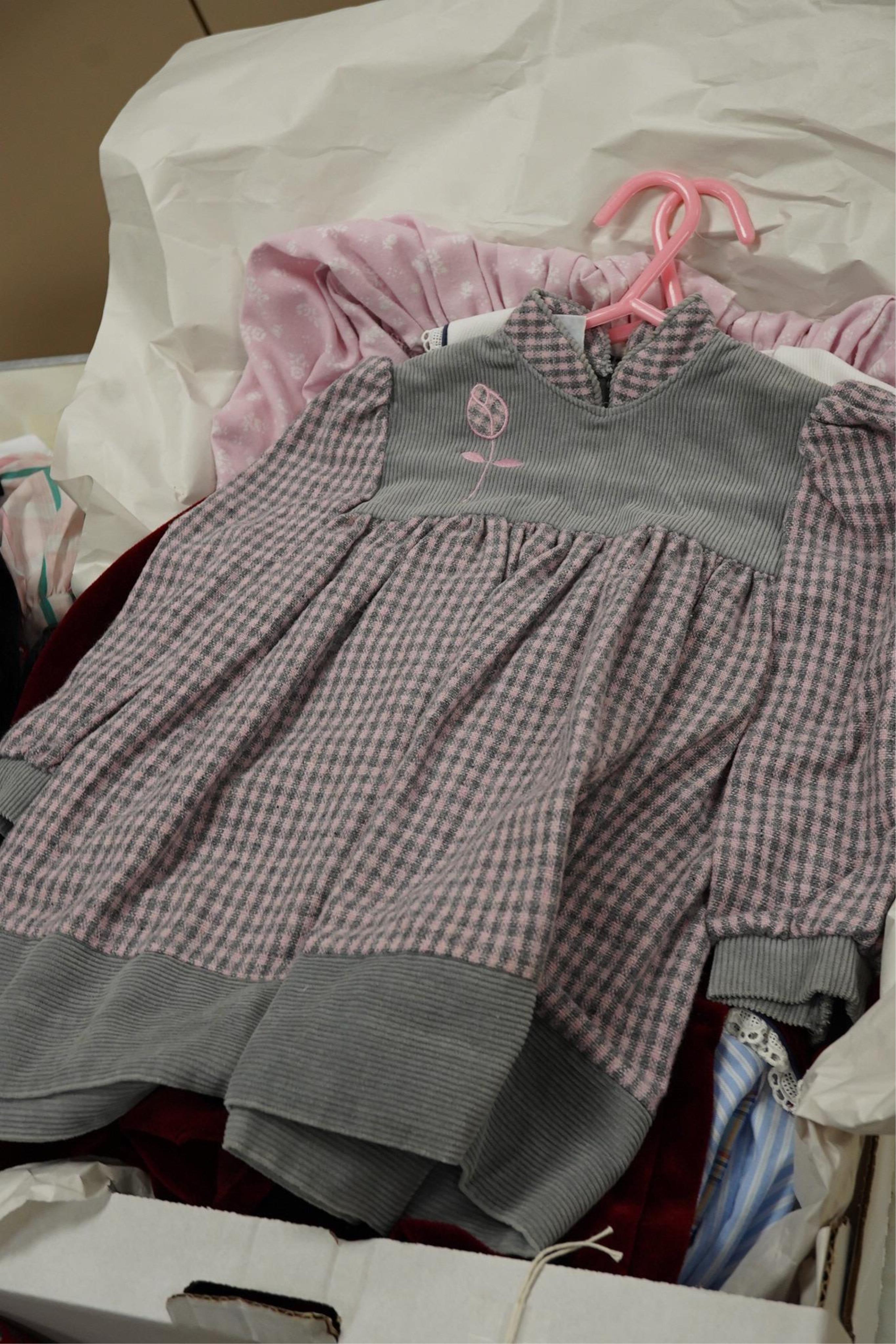 Twelve assorted 1980’s vintage children's dresses up to age eight, some hand smocked to include Harrods Belart, Chantel (including bell in hem), Michael de Leon, Heskia